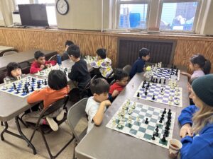 Children learning chess