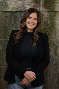 Angela Schedler, LCSW and founder of Zen + Zest Therapy